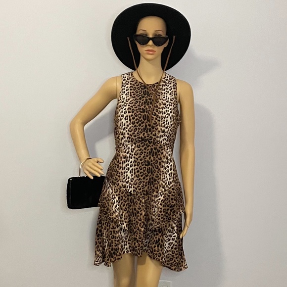 Cheetah print crewneck line sleeveless fit flare asymmetrical ruffled mini dress - Picture 2 of 14